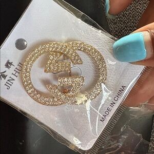 GG Gold Rhinestone Brooch